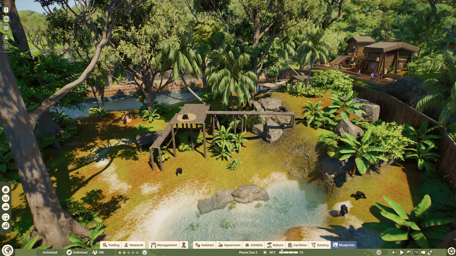 Tropical habitat with climbing frames and a pool